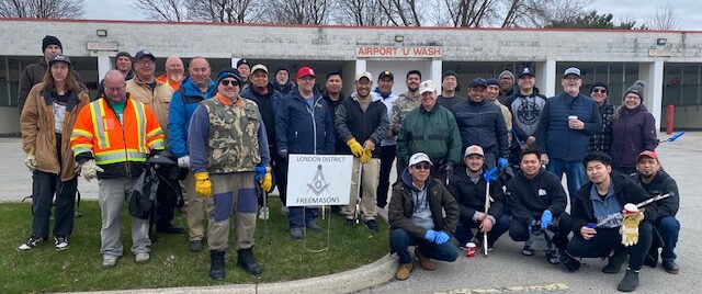 Tuscan Lodge 195 members posing during highway clean-up day in London Ontario showing community service and teamwork