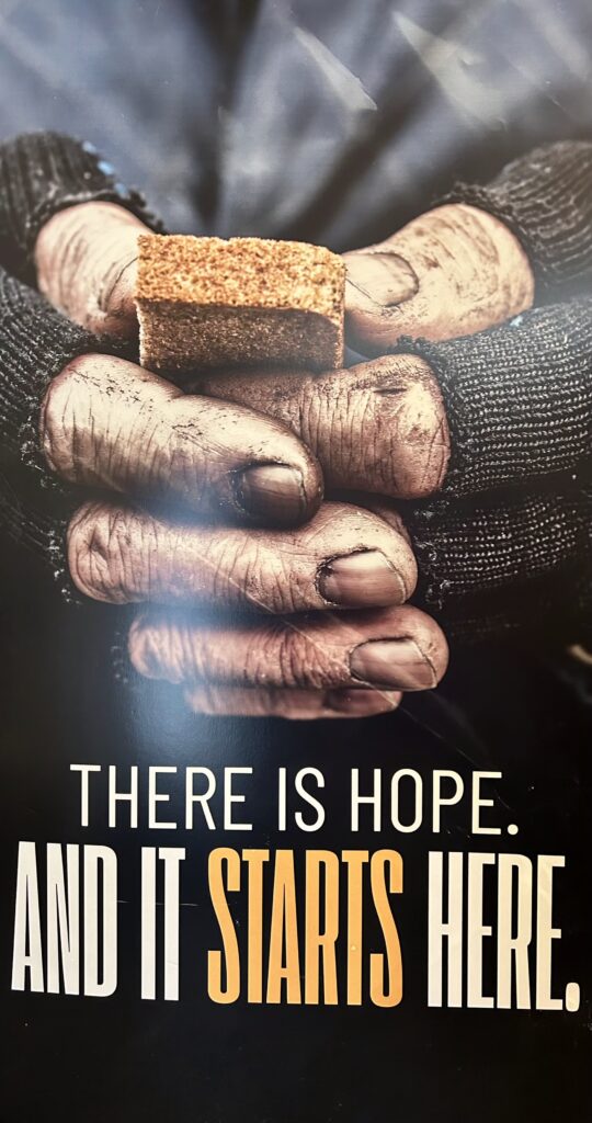 Poster displaying the message “There is Hope,” observed during a Tuscan Lodge No.195 donation visit, symbolizing encouragement and support for individuals facing hardship.