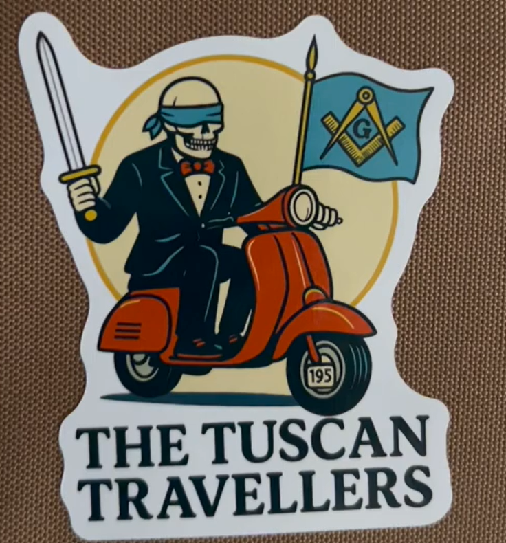 Tuscan Travellers logo sticker showing a stylized figure on a scooter with Masonic symbol flag and the words The Tuscan Travellers